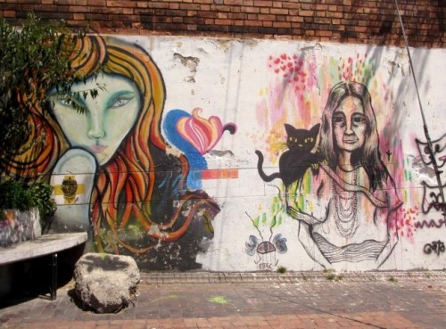 old woman and cat graffiti